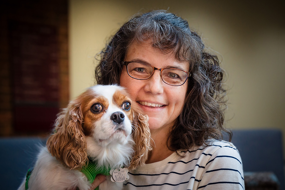 A picture of Margaret Bultas and her therapy dog.