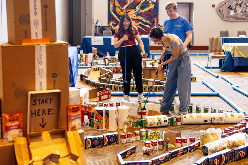 The Saint ֱοƵ University community stocked Billiken Bounty's shelves this week by playing through a mini golf course built out of shelf-stable food items. The event provided more than $2,600 in food and pantry items for the food pantry. 